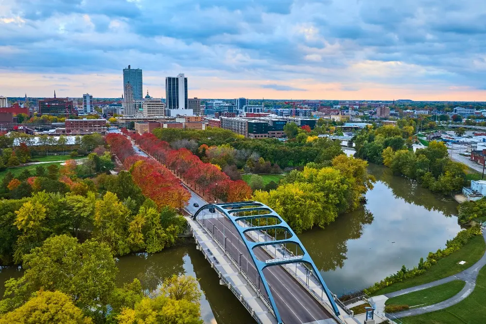 Aerial skyline view of downtown Fort Wayne, Indiana, highlighting the local community served by home remodeling contractor Home Enterprises Inc.